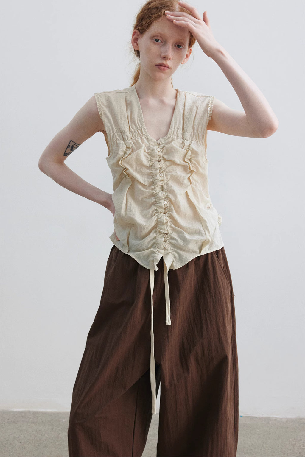 Ruched Sleeveless Top.