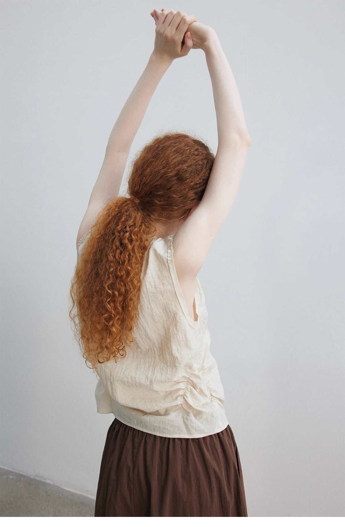 Ruched Sleeveless Top.