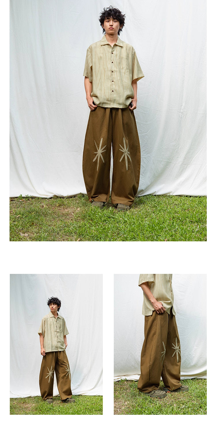 Star Embroidered Curved Blade Pants