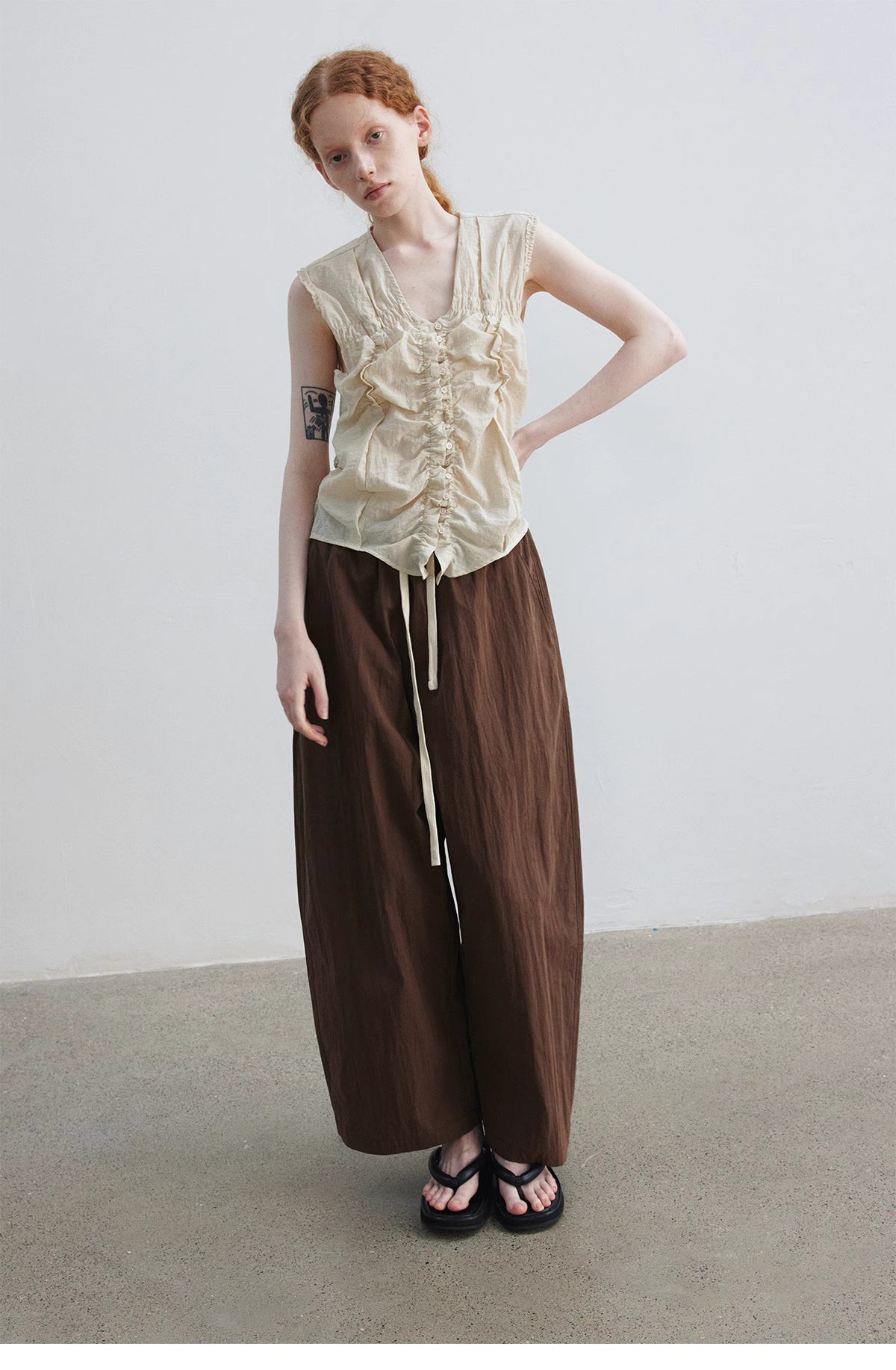 Ruched Sleeveless Top.