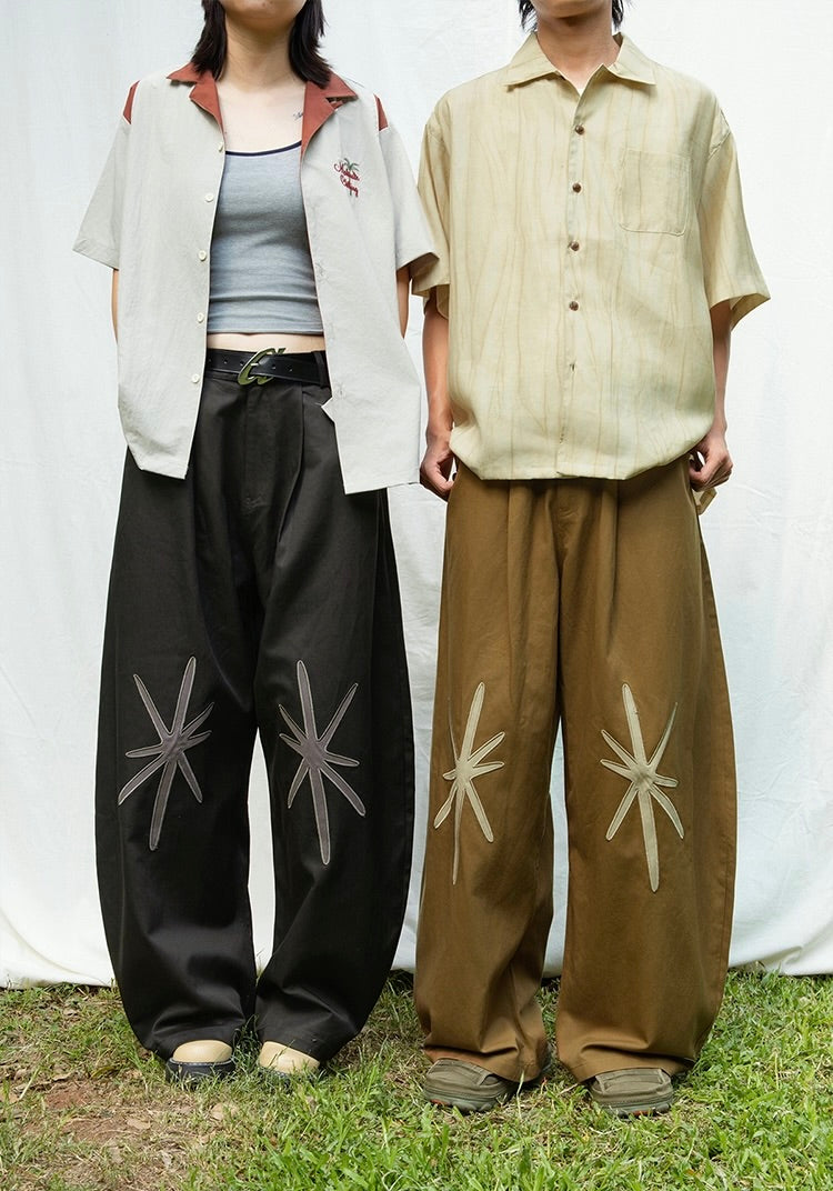 Star Embroidered Curved Blade Pants