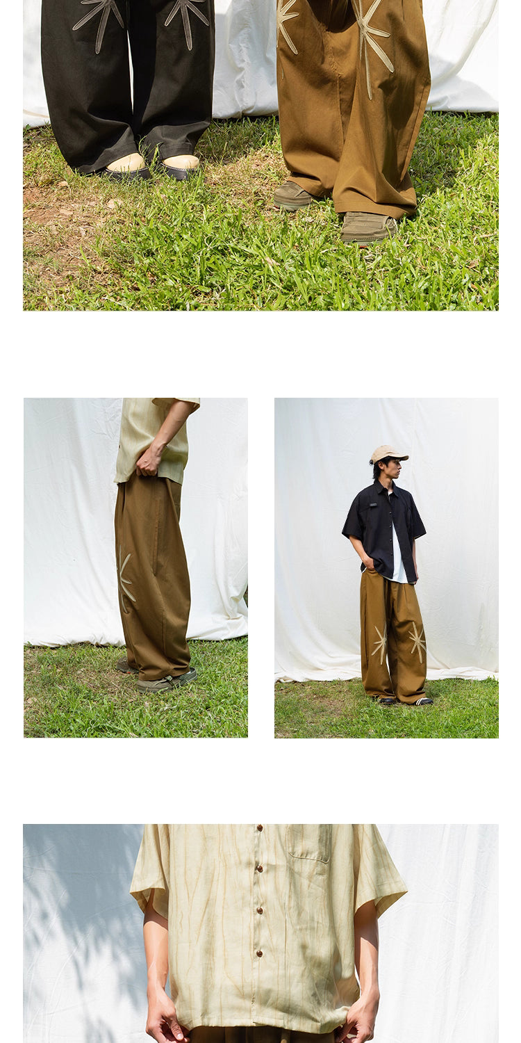 Star Embroidered Curved Blade Pants