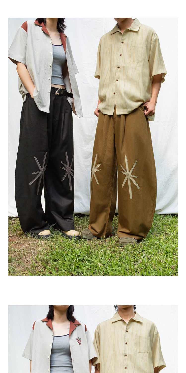 Star Embroidered Curved Blade Pants