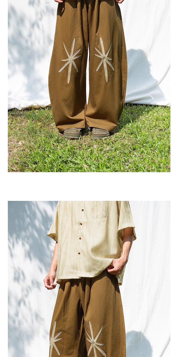 Star Embroidered Curved Blade Pants