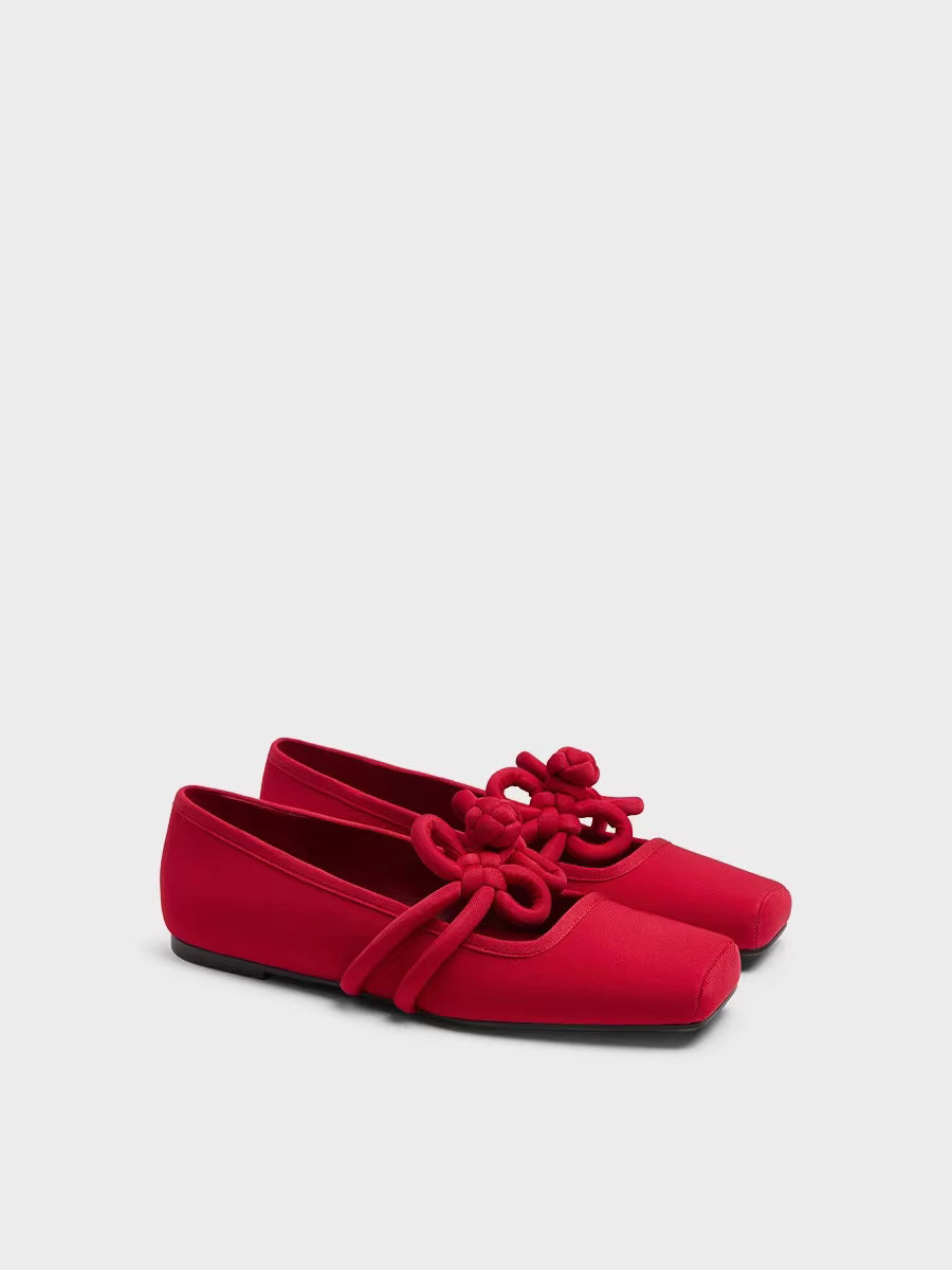 The JIE Knot Ballet Flat in Crimson and Obsidian