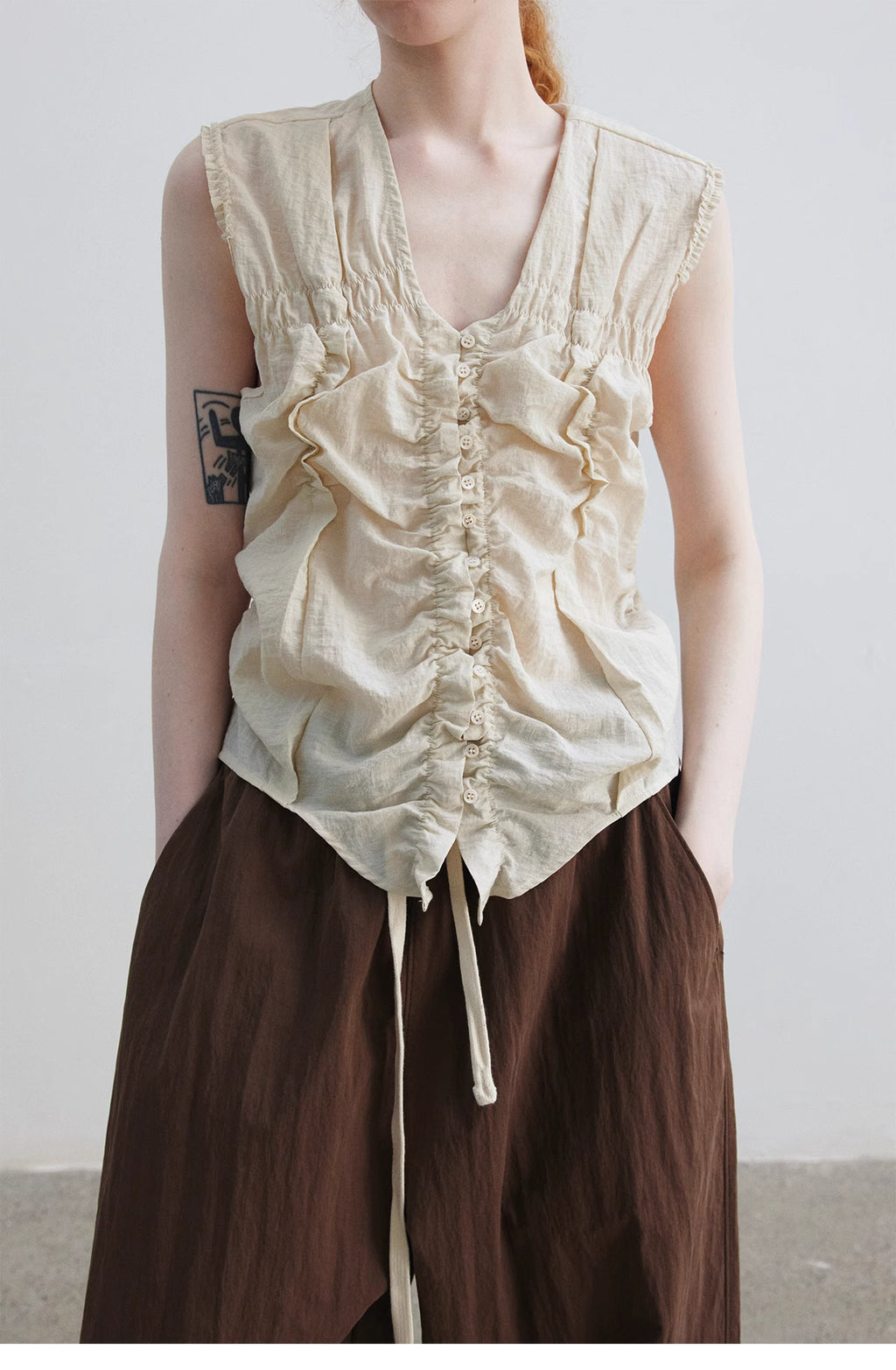 Ruched Sleeveless Top.