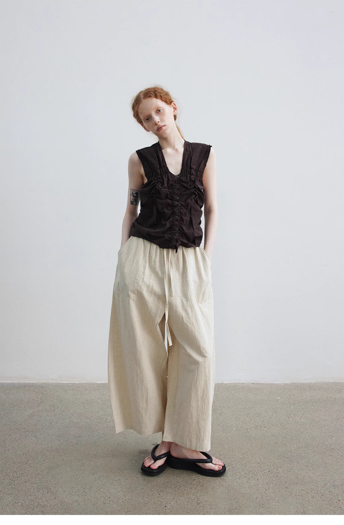 Ruched Sleeveless Top.