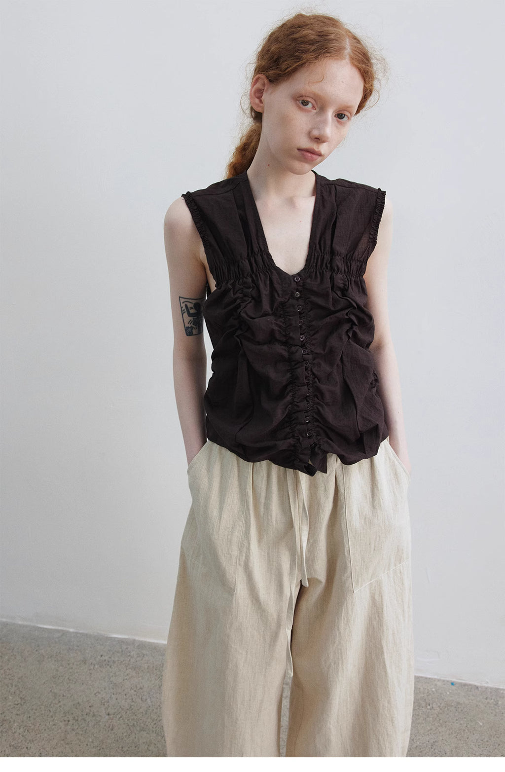 Ruched Sleeveless Top.