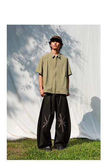 Star Embroidered Curved Blade Pants
