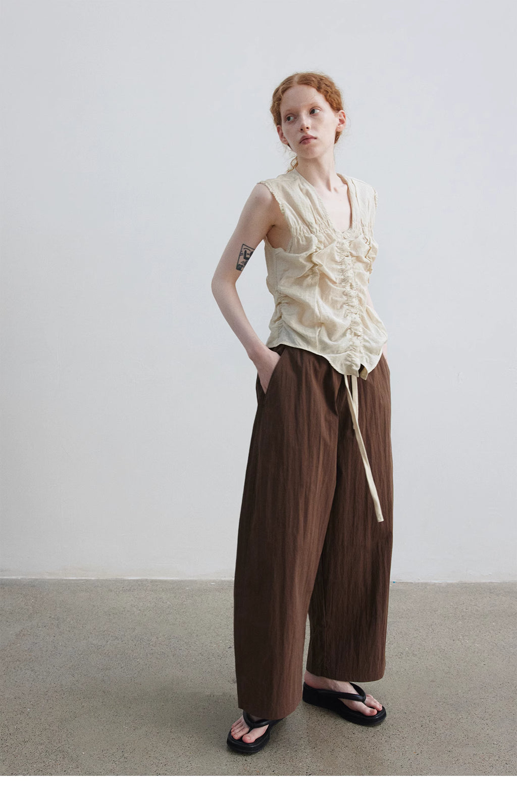 Ruched Sleeveless Top.