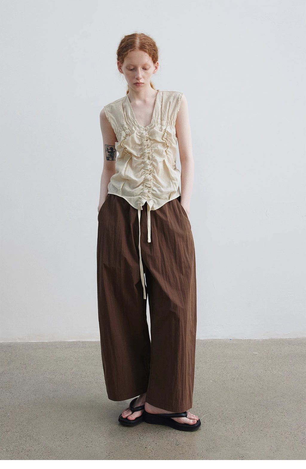 Ruched Sleeveless Top.