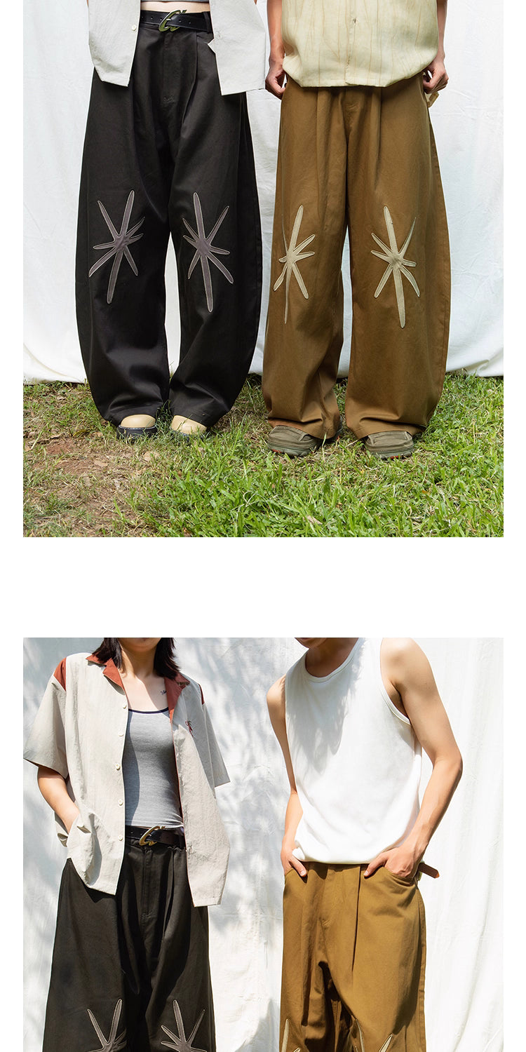 Star Embroidered Curved Blade Pants