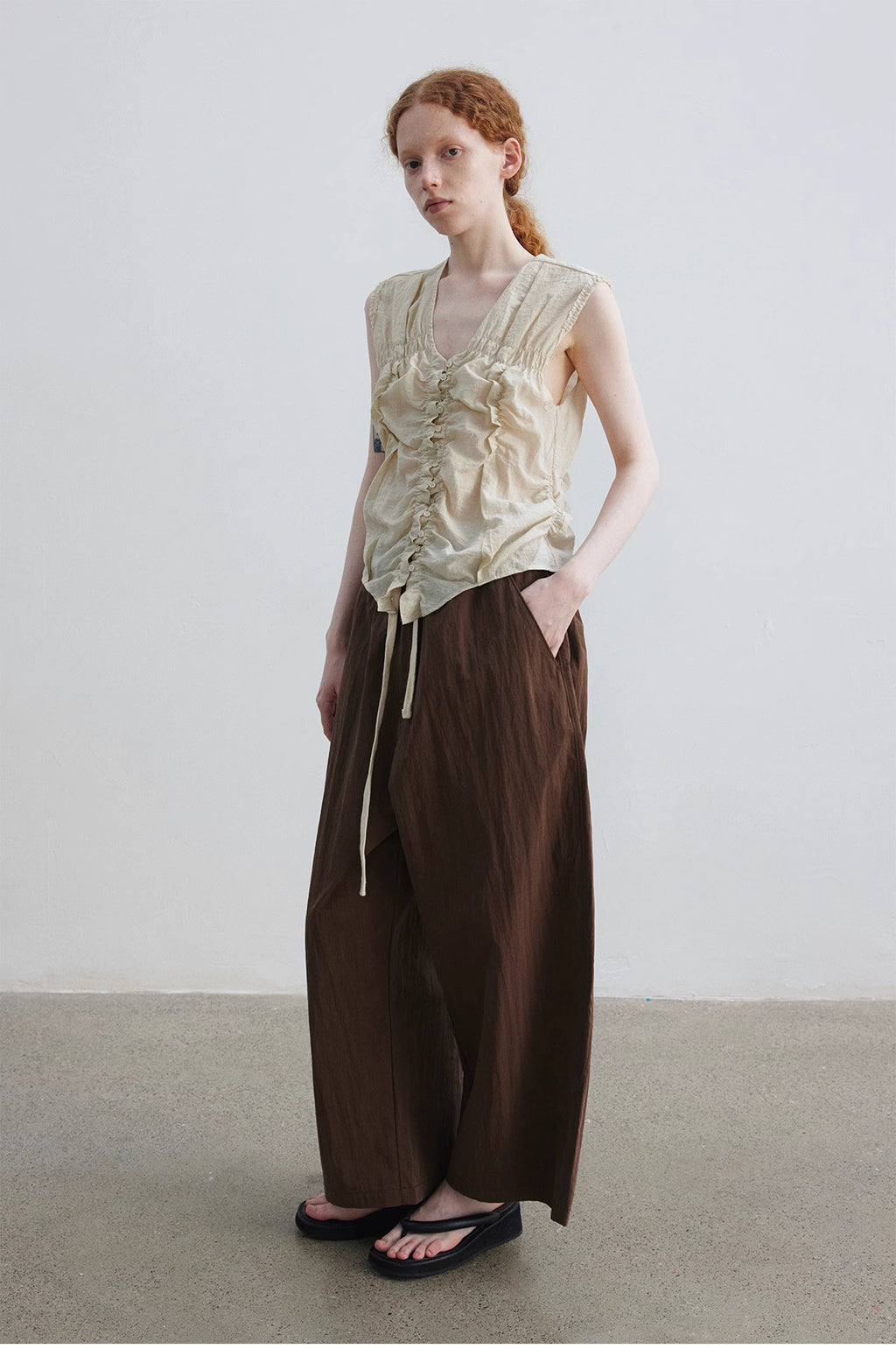 Ruched Sleeveless Top.