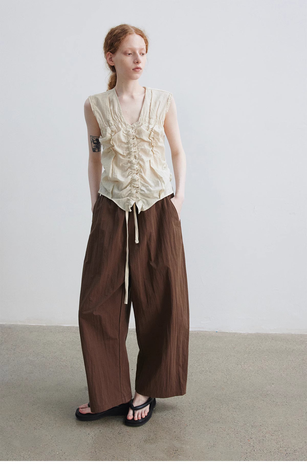 Ruched Sleeveless Top.