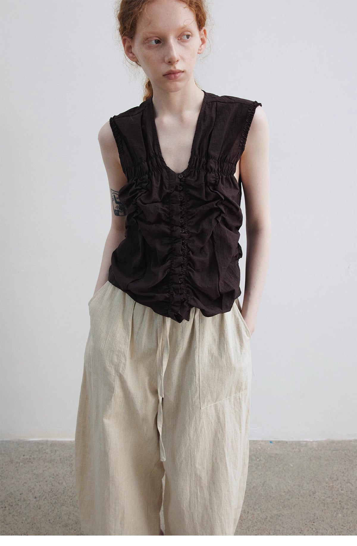 Ruched Sleeveless Top.