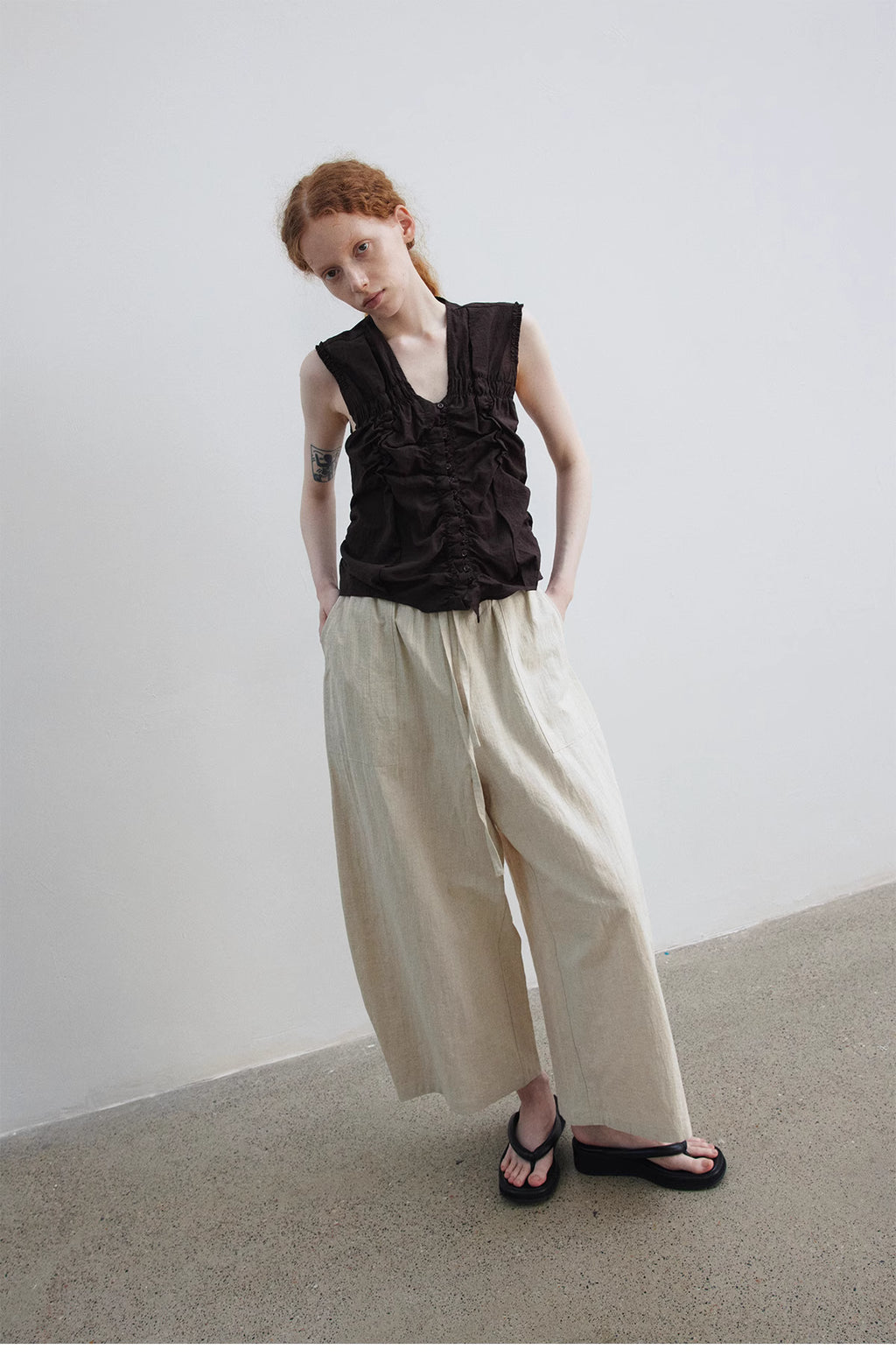 Ruched Sleeveless Top.