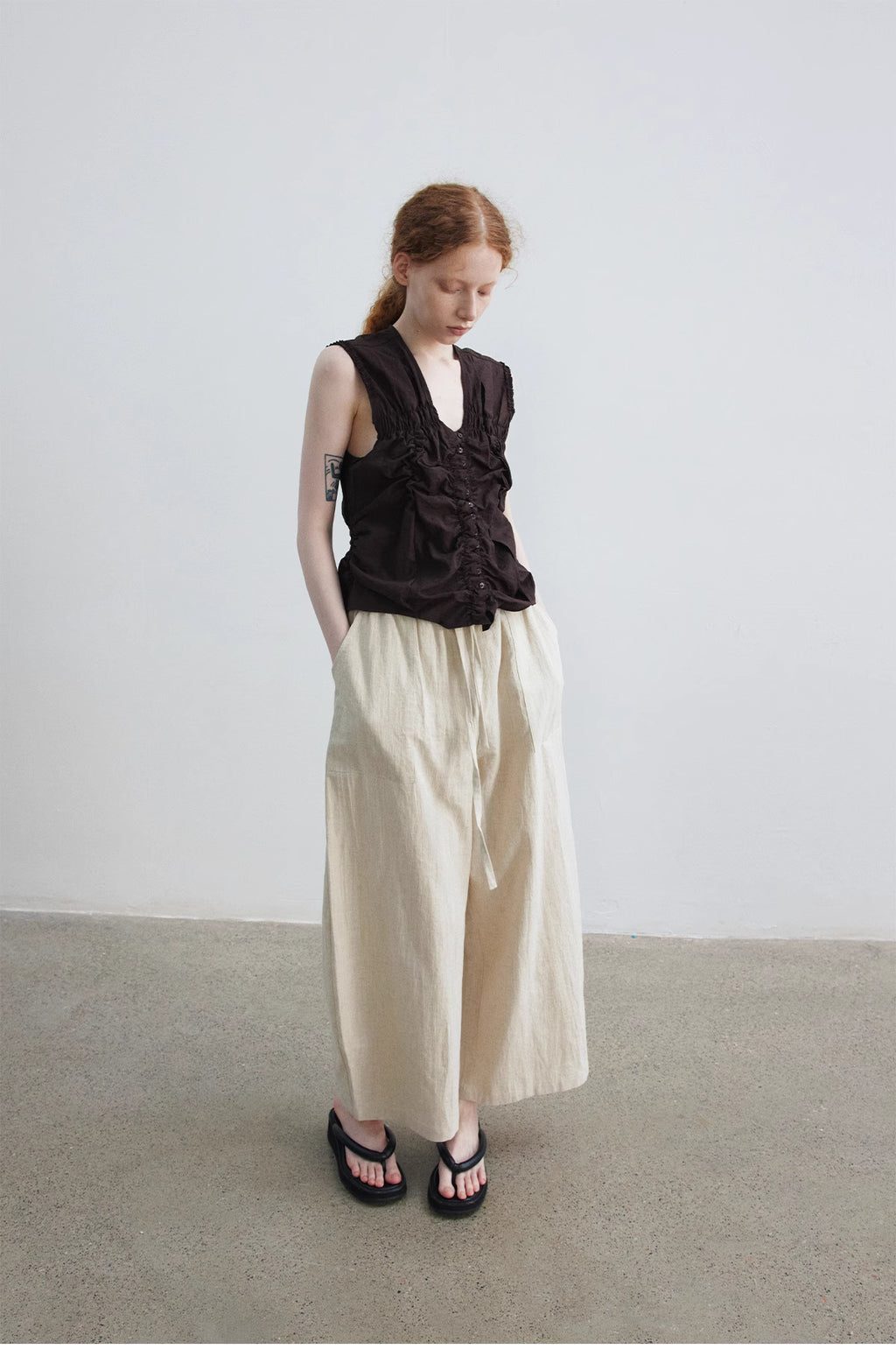 Ruched Sleeveless Top.