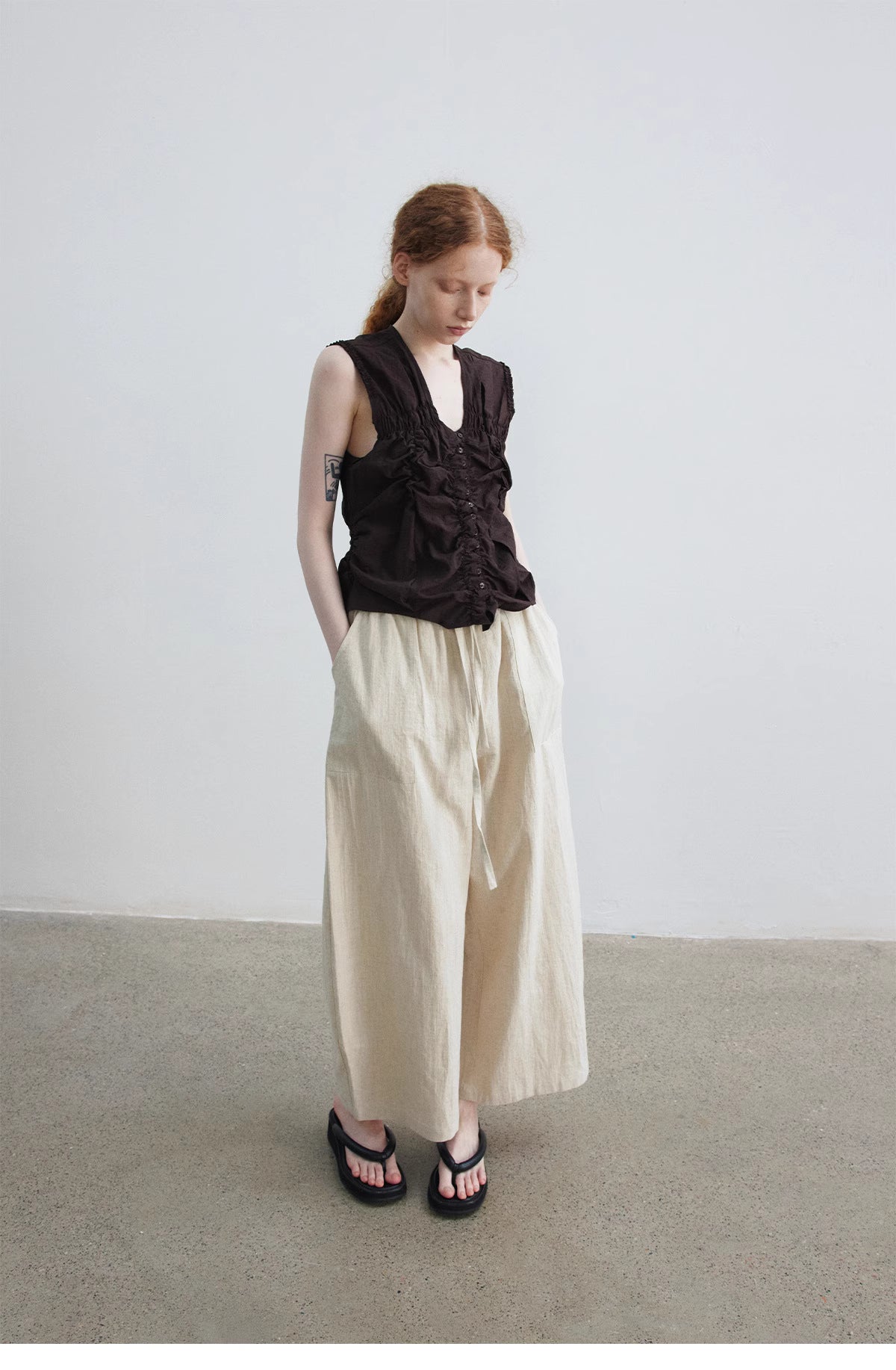 Ruched Sleeveless Top.