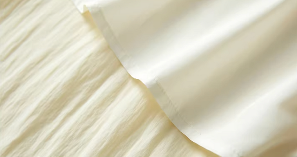 Vector-Point Asymmetric Skirt in Off-White or Navy