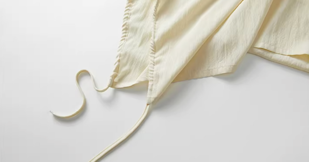 Vector-Point Asymmetric Skirt in Off-White or Navy